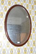 Edwardian Mahogany Framed Bevelled Oval Mirror