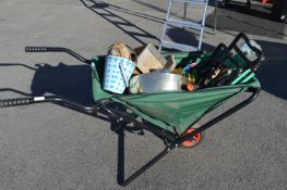 Fabric Folding Wheelbarrow Containing Garden Items