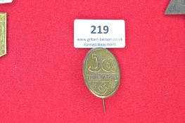 Brass Political Tinnie Badge “Ja – Treue um Treue – 1933” – An oval brass tinnie with bold “Ja”