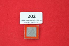 Square German Tinplate Badge – plain centre with red border, fitted with rear pin fastening. Shows