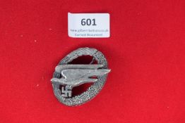 Luftwaffe Observer’s Badge – An oval wreath badge in silvered metal, featuring a large soaring eagle