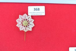 German Edelweiss Stickpin – A lace flower rosette stickpin centred with a gilt domed button in