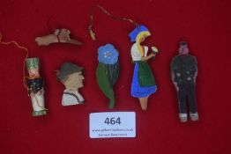 Six German WWII painted wooden badges — Flat cut-outs depicting rabbit, flower, Tyrolean couple,