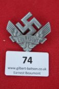 A German Third Reich RADwJ Female Labour Service Badge, die-cast zinc issue, winged swastika above