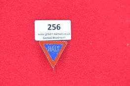 Enamelled Commemorative Tinnie Badge “Halt” – A triangular pressed tin badge with blue enamel centre