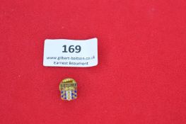 Small enameled badge – “Deauville,” shield with lions, souvenir type.