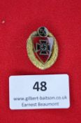 A German Third Reich 50 Years Service badge, gilt and enamel issue, laurel wreath enclosing party
