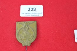 German Third Reich Era Day Badge – bronze-coloured pressed metal shield, depicting building within