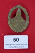 A German Third Reich NSDAP Regional Rally Badge, oval oakleaf wreath enclosing the