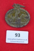 A German Third Reich Day Badge, oval pressed alloy issue for Gauparteitag Hameln 1935, eagle and