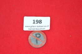 Vintage enamel badge, circular, featuring a 