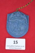 A commemorative badge for 700 Years Free Imperial City of Rottweil, blue plastic shield-shaped issue