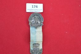 Bavarian veterans’ badge with lion and shield, ribbon in Bavarian colours, maker marked G.