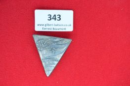 Pressed Metal BDM Spring Festival Badge – A triangular pressed metal badge depicting a floral