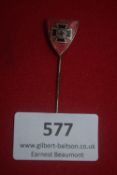Enamelled triangular shield stickpin, red field with black Iron Cross and central swastika.