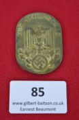 A German Third Reich NSDAP Reich Lottery badge, gilded tombac alloy issue, rectangular with