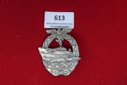Kriegsmarine E-Boat Badge – A Kriegsmarine E-Boat (Schnellboot) Badge, silvered and gilt, showing