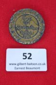 A German Third Reich School Festival Badge, circular pressed metal with oakleaf border, inscribed