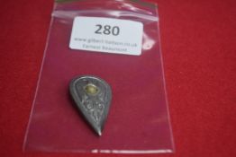 A German WWII-era membership badge, zinc construction. Reverse marked 