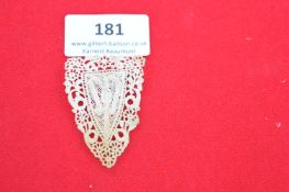 German lace badge, triangular white lace with central “W” motif, pin to reverse, early 20th