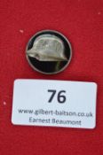 A German Stahlhelm Veterans’ Badge, oval issue with central raised steel helmet inscribed “Der