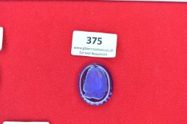 Blue glass pendant, oval, with bust portrait and legend “Anne Boleyn”, suspension hole at top.