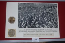 Two WHW badges commemorating the Saar plebiscite of 1933–34, mounted with a period photograph of