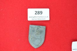 Pressed Metal Commemorative Shield Badge “Edertalsperre Wiederaufbau” – Shield-shaped grey alloy