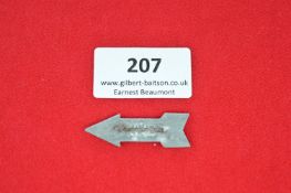 German Tinplate Road Sign Badge – arrow-shaped badge similar to previous lot, marked “66” to