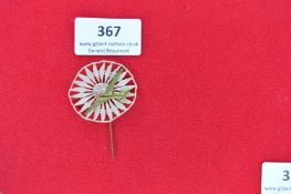 German Glider Stickpin – A lace rosette stickpin fitted with a small brass glider motif affixed to