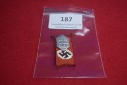 German Third Reich era political rally ribbon badge, red cloth with white circle and black swastika,