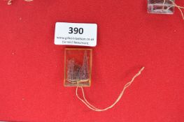 Glass Souvenir Plaque of Ulm Minster – A rectangular translucent glass plaque, tinted yellow-