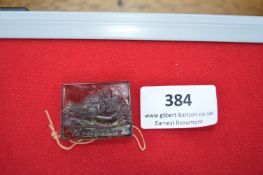 Glass Souvenir Plaque of Marienburg Castle – A rectangular brown glass plaque showing a detailed