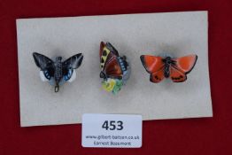 A German WWII WHW set of porcelain butterfly badges, brightly coloured examples with naturalistic