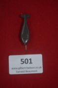 Winterhilfswerk (WHW) stickpin in the form of an aerial bomb
