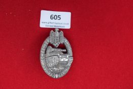 Panzer Assault Badge (Panzerkampfabzeichen) – A silvered, die-cast badge with oak leaf wreath