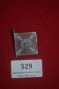 WHW miniature flag badge in the form of a Flak-Artillerie standard, enamelled in red, white and