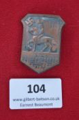A Sturmabteilung (SA) equestrian rally commemorative badge, bronze issue, shield-shaped with