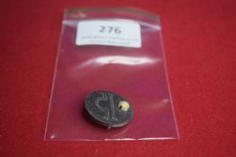 A German WWII-era membership badge, zinc construction. Reverse marked 