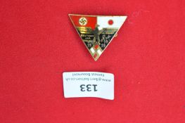 A 1939 German-Japanese Friendship Badge, triangular gilt and enamel issue featuring national emblems