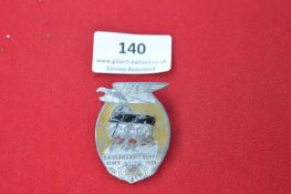 2. Nordmarktreffen badge, 1936, oval, eagle over helmets, maker Paulmann & Crone.