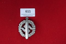 SA Sports Badge in Silver – An SA Sports Badge in silver, oval, with a swastika and superimposed