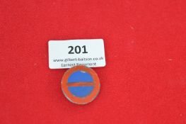 Vintage enamel badge, circular, blue centre with red border and horizontal red bar—traditional 