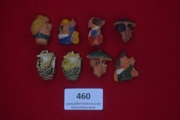 Collection of eight German WWII terracotta caricature badges — Comic busts of assorted figures,