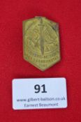 A German Third Reich Day Badge, gilt alloy shield-shape for Schleswig-Holstein Waldarbeitertag,
