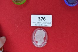 Clear glass pendant, oval, with bust portrait of Adolf Hitler, name engraved around edge, suspension