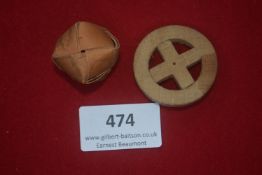 A German WWII WHW day badge, comprising a woven straw ball with backing disc and pin fitting.