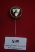 Enamel stickpin, circular wreath with central shield in black, white, red and green, surmounted by