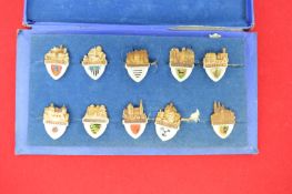 Set of Sächsische Burgen und Schlösser Badges – A boxed set containing eleven pressed metal and