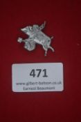 A German WWII WHW pressed-metal day badge, in the form of a pig holding a basket of clover, with